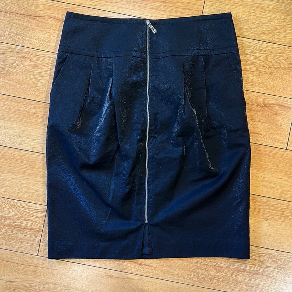 Black metallic skirt with zipper in middle. NWT. Size 10